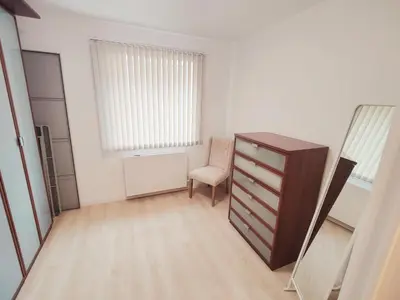 a room with a dresser and a chair in it at Princenhuis37 in Tongeren