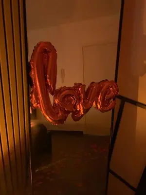 a balloon in the shape of a love sign at La home Gold Jacuzzi in Seraing