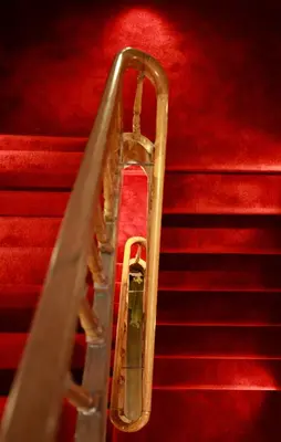 a trumpet on the side of some stairs at Hotel De Boskar Pelt in Pelt