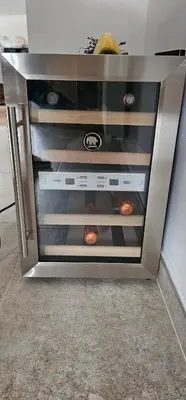 a microwave oven with some food inside of it at Comme chez Soi in Liège