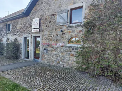 a stone building with a window and a door at L'Appart - New Appartement - Free Parking - Self Check-in - Terrasse in Eynatten