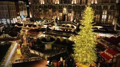 an aerial view of a christmas market with a christmas tree at Raelax in Raeren