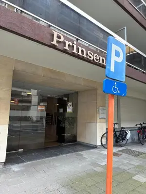 a blue parking sign in front of a building at Hasselita in Hasselt