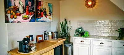 a kitchen with a counter with a sink and a counter sidx sidx at 't Herenhoes in Pelt