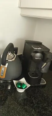 a computer printer sitting on top of a counter at holiday home Zonnestraal in Zonhoven