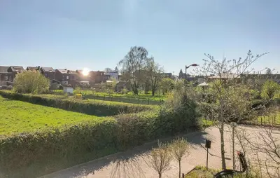 a view of a park with trees and houses at 1 Bedroom Lovely Apartment In Visé in Visé