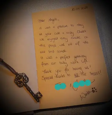 a sheet of paper with a key on it at Chalet Klein Geluk in Lanaken