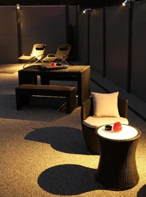 a room with chairs and a chair and a table at Le Gate One in Herbesthal