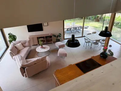 an overhead view of a living room with chairs and a table at Zandberg11 in Bree