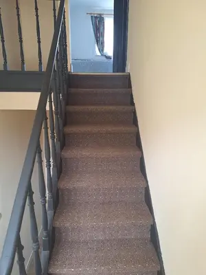a flight of stairs in a house at Tc home in Liège