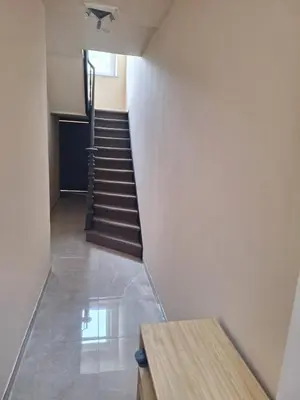 a staircase in a building with a stair case at Tc home in Liège