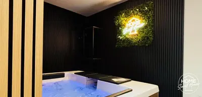 a bathroom with a sink and a bath tub at Luxury Loft Home Sweet House in Oupeye