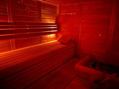 an empty sauna with a red light in it at heerlijk vakantie huis Lovely holiday home in Lanaken