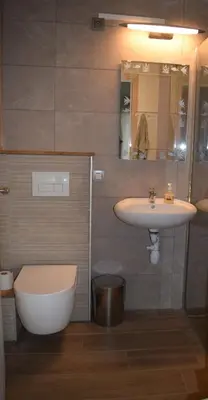 a bathroom with a sink and a toilet at Casa Loon in Borgloon