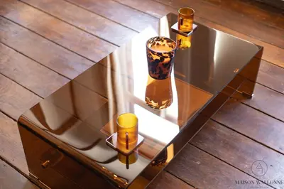 a glass table with two vases on top of it at Le cocon chic - Hypercentre, Place du Marché in Liège