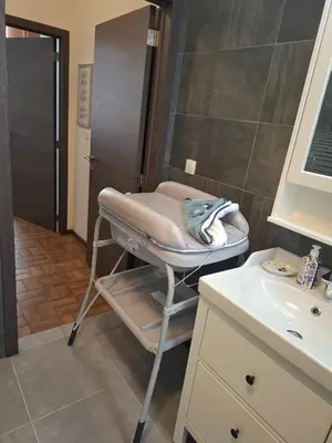 a small bathroom with a sink and airming at La Belle Échappée à Fléron in Fléron
