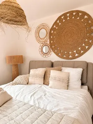 a bed with white sheets and pillows in a bedroom at Ibiza LOFT MOLN in Kinrooi