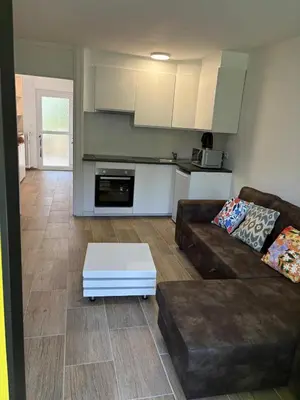 a living room with a couch and a coffee table at Appart de Lux , 3 borders , free parking , in La Calamine