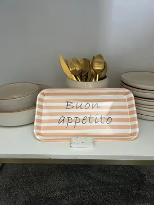 a lunch box sitting on a table with bowls and spoons at Felicita in Jalhay