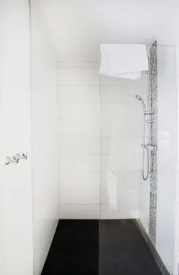 a shower in a bathroom with a glass wall at 302 Le Spot Neuvice in Liège