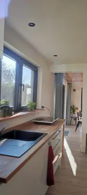 a kitchen with a sink and a counter top at Vacation on the farm in Lanaken