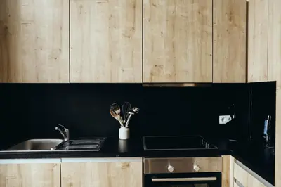 a kitchen with a sink and a counter top at Liège Centre-ville by WelcHome in Liège