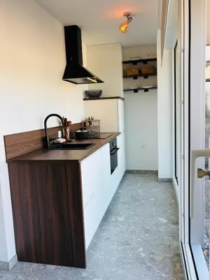 a kitchen with a sink and a counter top at GG'S studio in Hasselt