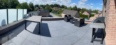 a skate park with benches on top of a building at Duplex appartement met 3 slaapkamers in Genk