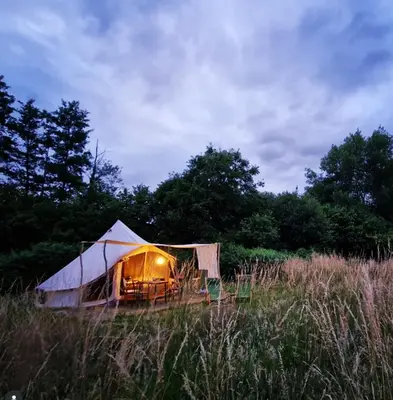a tent in the middle of a field at Strackxhoeve Veldtent 'Veldslaap' in Laakdal
