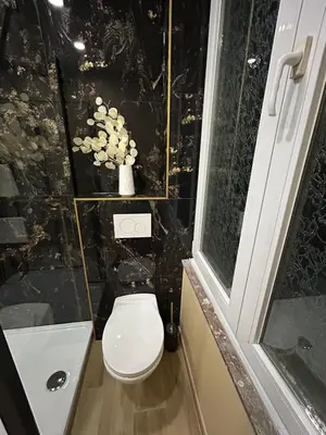 a black bathroom with a toilet and a sink at Chambre de luxe Afrik a Liège Grande Sale de bain privée check in autonome cuisine partagée in Liège