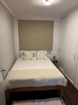 a bedroom with a large bed with white sheets and pillows at Casa Sahara - 8 guests - near nature reserve in Lommel