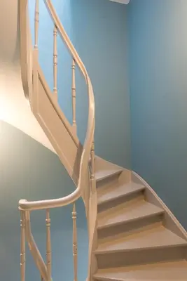 a set of stairs in a house at La petite Naimette in Liège