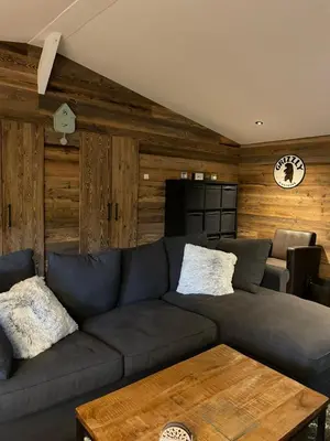a living room with a couch and a table at La Luna in Lanaken