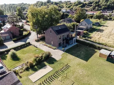 an aerial view of a house with a yard at Le Surdan in Bassenge