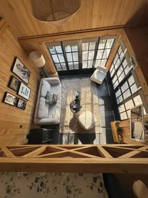 an overhead view of a living room in a tree house at Green Oak House in Dilsen-Stokkem