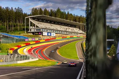 a race track with cars driving on a road at Aux Cèdres - Peaceful stay with easy parking in Liège