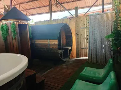 a bathroom with a sink and a bath tub at Single-storey holiday home in Heers in Heers