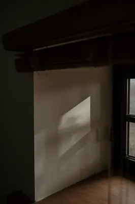 a white wall in a room with a window at Molhemhoeve in Peer