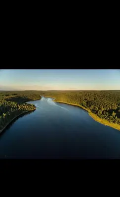 an aerial view of a river in the middle at Le Marzelheide 1 in Lontzen