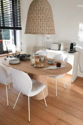 a dining room table with white chairs in a room at Homestorys Nature Resort - Wood Lounge in Eupen