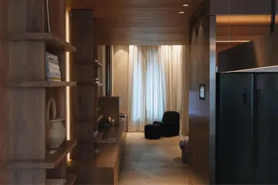 a hallway with a living room with a window at number nine house in Hasselt