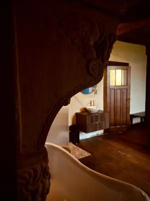 a bathroom with a tub and a sink at 'T Rood Kasteel in Hasselt