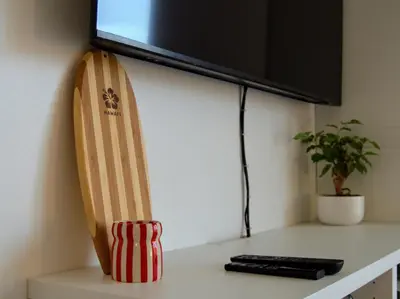 a surfboard sitting on a counter in a room at Le Liégeois - Confort au Centre Ville in Liège