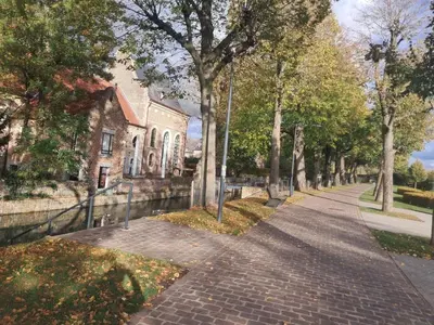 a brick road in front of a house at Domus moerenpoort in Tongeren