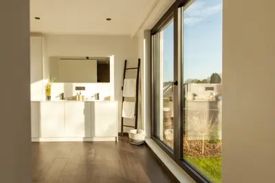 a bathroom with a sink and a large window at 8P 4B Luxury Villa Close to Maastricht in Lanaken