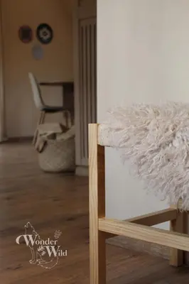 a room with a chair with a pile of fur at Wonderwild E87, Connect to nature & Dog Friendly in Lanaken