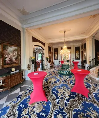 a room with two red stools on the floor at Kasteel Rosmeulen in Mall