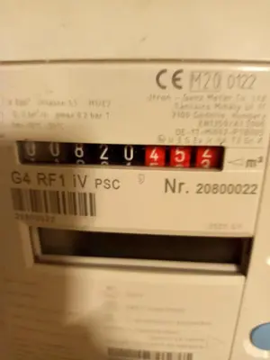 a close up of a microwave oven with red lights at La Vie en Rose in Ensival