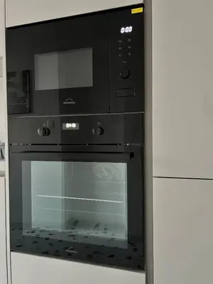 a black oven with a glass door in a kitchen at Casa Cielo-Spectacular View-Center-Chic-Spacious in Liège
