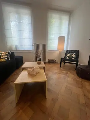 a living room with a couch and a coffee table at House with garden for 4 people in Verviers